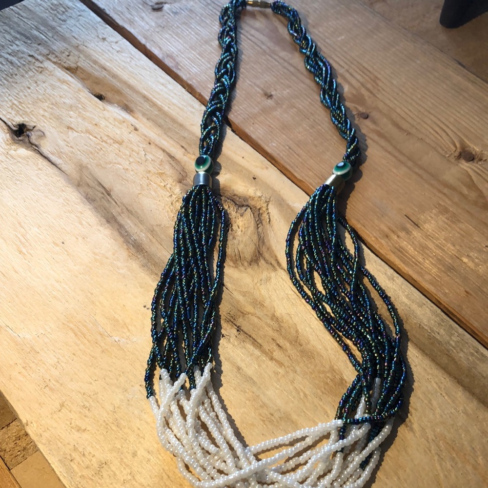 Beaded necklace with peacock bead accents